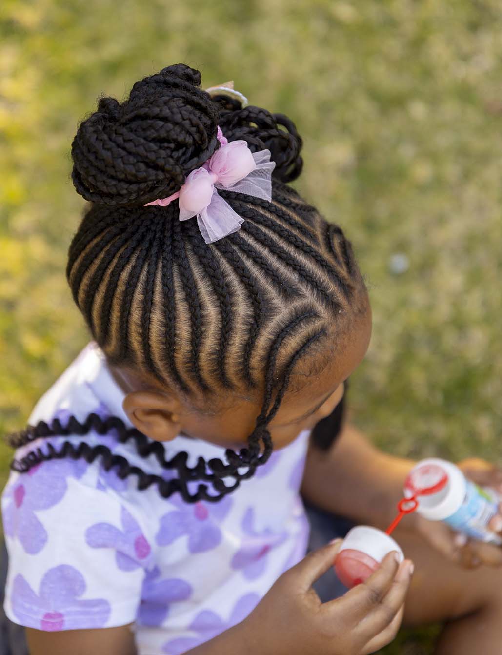 Milani Pink Pom Pom Bow